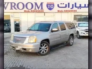 GMC  Yukon  Denali  2009  Automatic  270,000 Km  8 Cylinder  Four Wheel Drive (4WD)  SUV  Gold