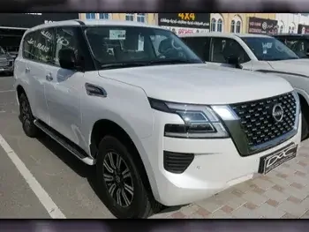 Nissan  Patrol  XE  2023  Automatic  0 Km  6 Cylinder  Four Wheel Drive (4WD)  SUV  White  With Warranty