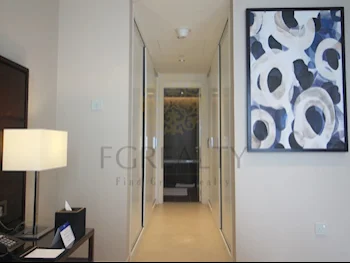 2 Bedrooms  Apartment  For Rent  in Doha -  West Bay  Fully Furnished