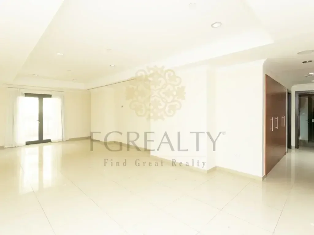 2 Bedrooms  Apartment  For Rent  in Doha -  The Pearl  Not Furnished