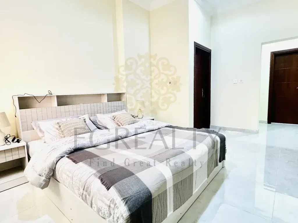 2 Bedrooms  Apartment  For Rent  in Doha -  Al Sadd  Fully Furnished