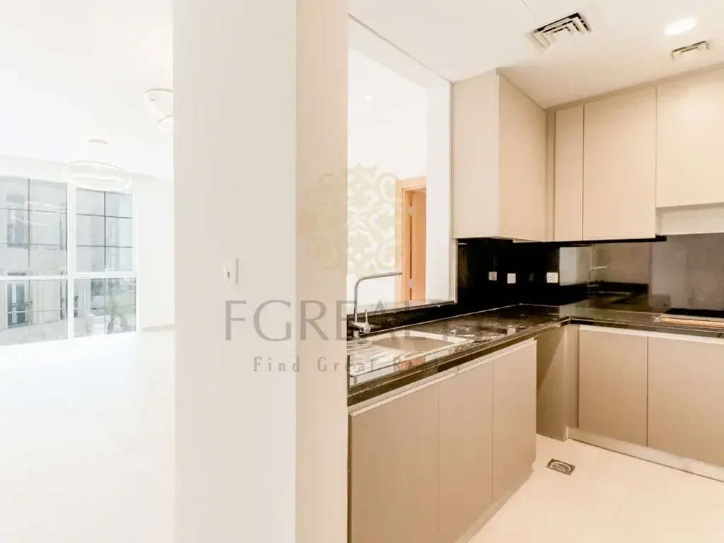 2 Bedrooms  Apartment  For Rent  in Doha -  The Pearl  Not Furnished