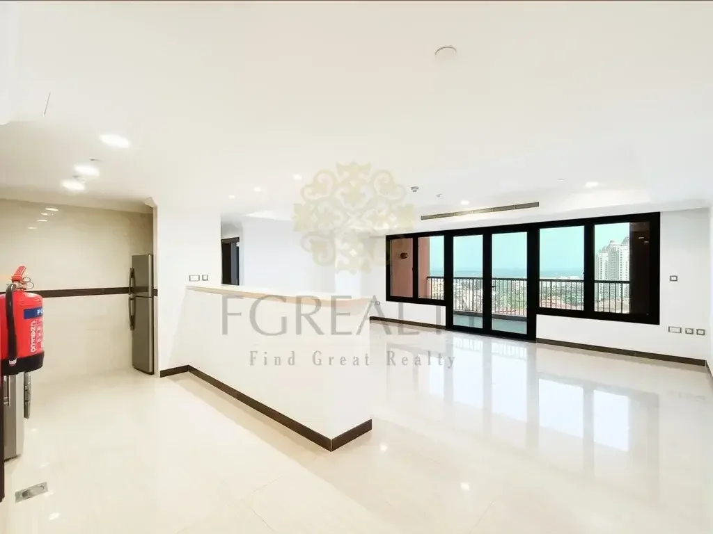 2 Bedrooms  Apartment  For Rent  in Doha -  The Pearl  Not Furnished