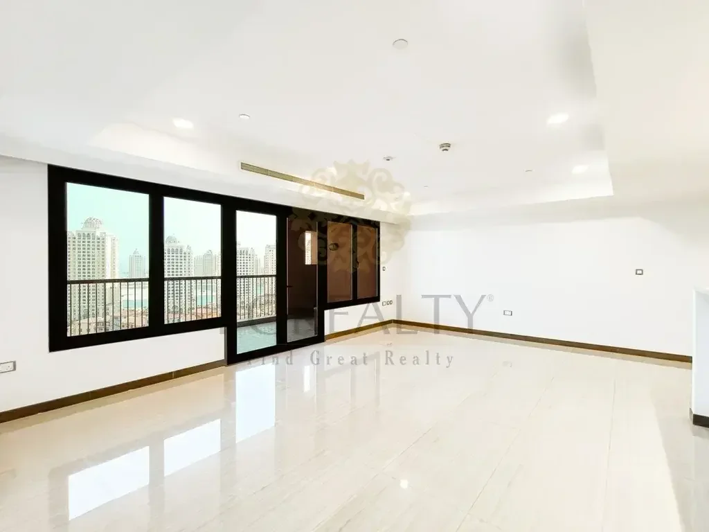 2 Bedrooms  Apartment  For Rent  in Doha -  The Pearl  Not Furnished