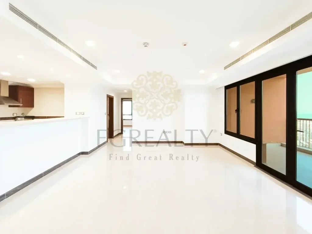 2 Bedrooms  Apartment  For Rent  in Doha -  The Pearl  Not Furnished