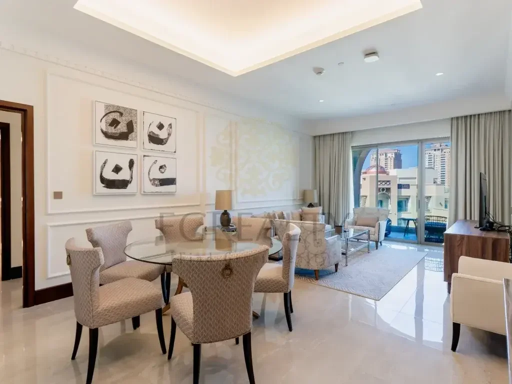 3 Bedrooms  Apartment  For Rent  in Doha -  The Pearl  Fully Furnished