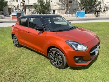 Suzuki  Swift  4 Cylinder  Hatchback  Orange  2022