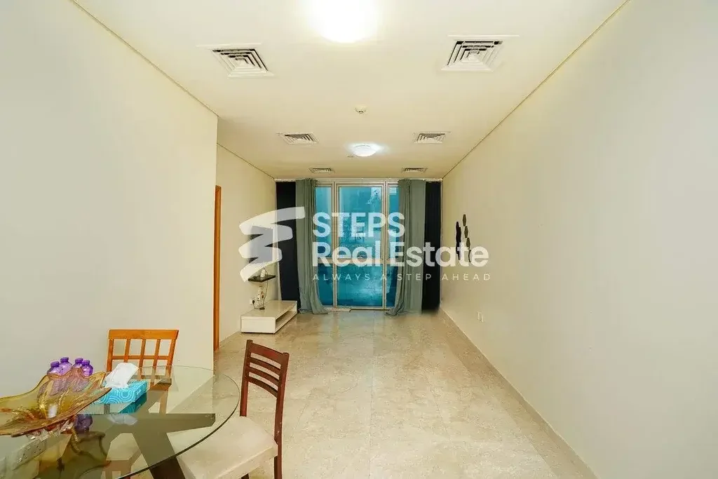 2 Bedrooms  Apartment  For Sale  in Doha -  West Bay  Semi Furnished