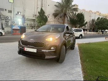 Kia  Sportage  4 Cylinder  2x4  Brown  2021