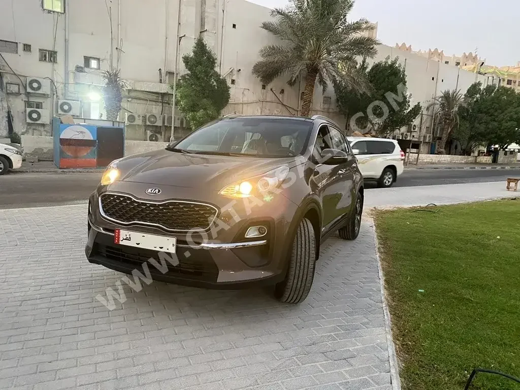 Kia  Sportage  4 Cylinder  2x4  Brown  2021