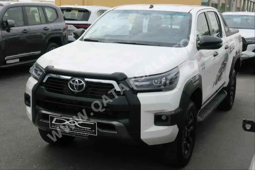 Toyota  Hilux  SR5 Adventure  2023  Automatic  0 Km  4 Cylinder  Four Wheel Drive (4WD)  Pick Up  White  With Warranty