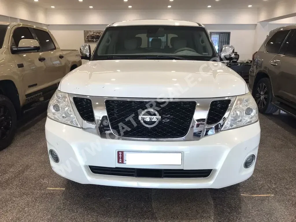 Nissan  Patrol  LE  2012  Automatic  226,000 Km  8 Cylinder  Four Wheel Drive (4WD)  SUV  White