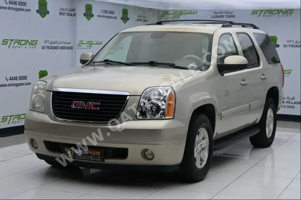 GMC  Yukon  2011  Automatic  180,000 Km  8 Cylinder  Rear Wheel Drive (RWD)  SUV  Gold