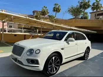 Bentley  Bentayga  2017  Automatic  53,000 Km  12 Cylinder  Four Wheel Drive (4WD)  SUV  White