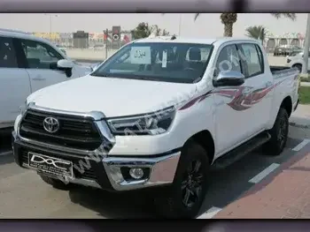 Toyota  Hilux  2023  Automatic  0 Km  4 Cylinder  Four Wheel Drive (4WD)  Pick Up  White  With Warranty