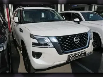 Nissan  Patrol  SE  2023  Automatic  0 Km  6 Cylinder  Four Wheel Drive (4WD)  SUV  White  With Warranty