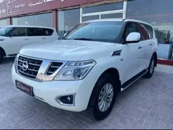 Nissan  Patrol  SE  2015  Automatic  287,000 Km  8 Cylinder  Four Wheel Drive (4WD)  SUV  White