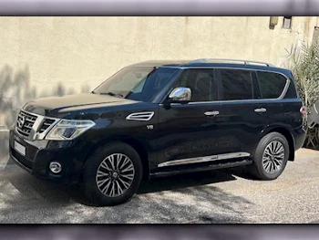 Nissan  Patrol  Platinum  2015  Automatic  115,000 Km  8 Cylinder  Four Wheel Drive (4WD)  SUV  Black