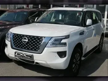 Nissan  Patrol  SE  2023  Automatic  0 Km  6 Cylinder  Four Wheel Drive (4WD)  SUV  White  With Warranty