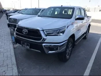 Toyota  Hilux  SR5  2024  Automatic  0 Km  4 Cylinder  Four Wheel Drive (4WD)  Pick Up  White  With Warranty