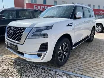 Nissan  Patrol  Titanium  2023  Automatic  0 Km  8 Cylinder  Four Wheel Drive (4WD)  SUV  White  With Warranty