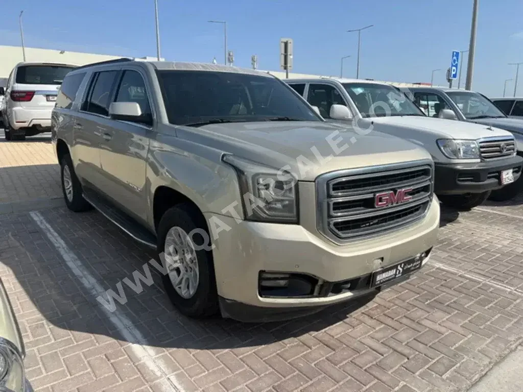 GMC  Yukon  XL  2015  Automatic  241,000 Km  8 Cylinder  Four Wheel Drive (4WD)  SUV  Beige