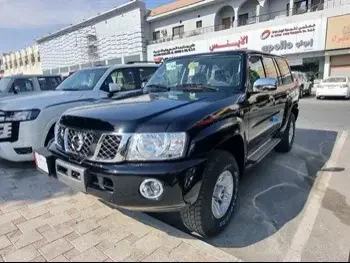 Nissan  Patrol  Safari  2023  Manual  0 Km  6 Cylinder  Four Wheel Drive (4WD)  SUV  Black  With Warranty