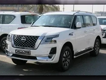 Nissan  Patrol  Titanium  2023  Automatic  0 Km  6 Cylinder  Four Wheel Drive (4WD)  SUV  White  With Warranty