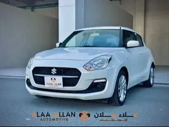 Suzuki  Swift  2023  Automatic  37,000 Km  4 Cylinder  Front Wheel Drive (FWD)  Hatchback  White  With Warranty