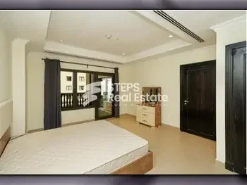 1 Bedrooms  Apartment  For Rent  in Doha -  The Pearl  Semi Furnished