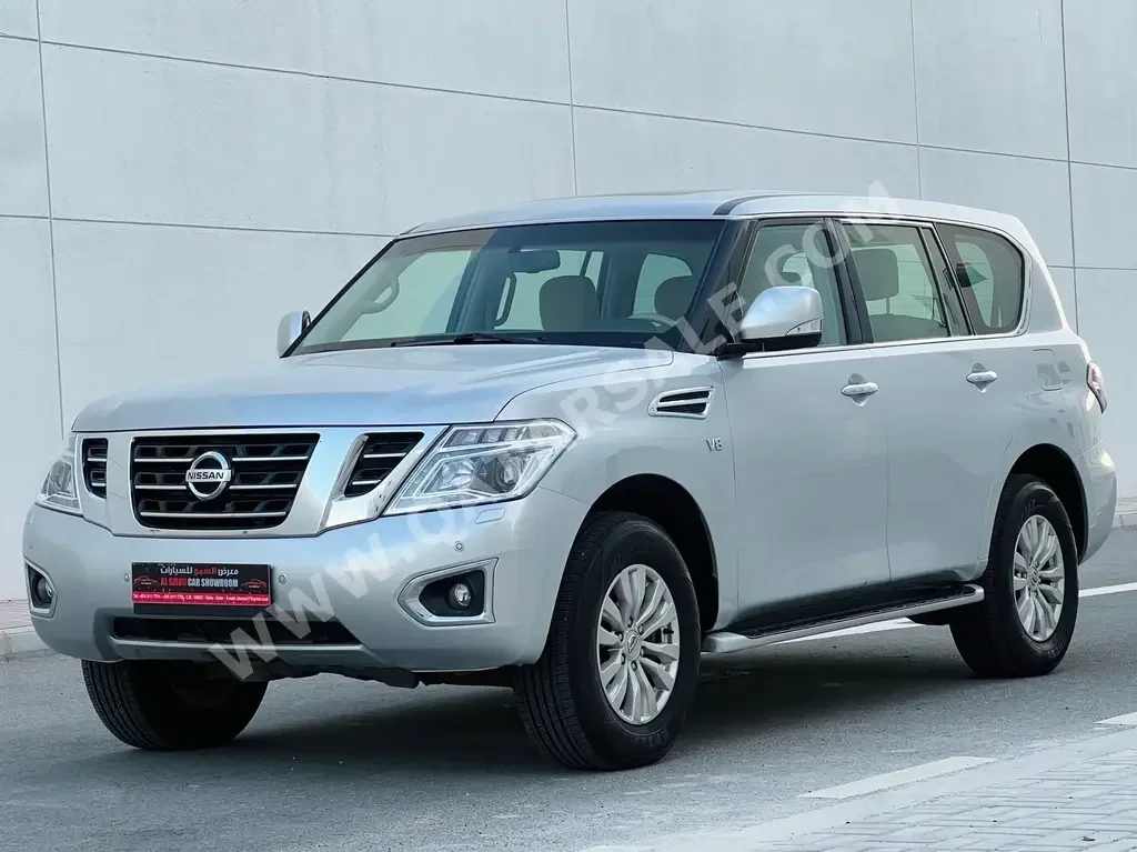 Nissan  Patrol  SE  2015  Automatic  242,000 Km  8 Cylinder  Four Wheel Drive (4WD)  SUV  Silver