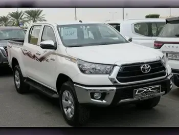 Toyota  Hilux  2024  Automatic  0 Km  4 Cylinder  Four Wheel Drive (4WD)  Pick Up  White  With Warranty