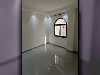 2 Bedrooms  Apartment  For Rent  in Doha -  Umm Ghuwailina  Not Furnished