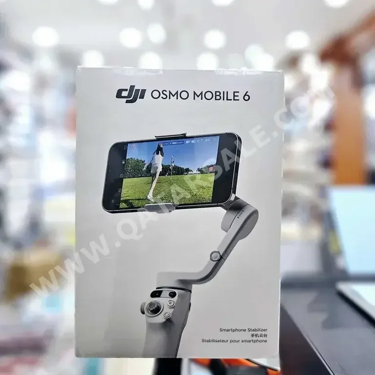 مثبت (ترايبود)  اللون الرمادي  دي جي  2022  OSMO MOBILE 6  ضمان