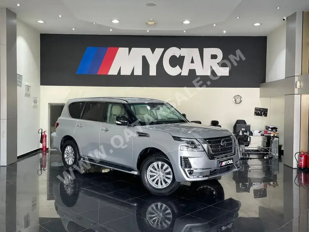 Nissan  Patrol  XE  2015  Automatic  123,000 Km  8 Cylinder  Four Wheel Drive (4WD)  SUV  Silver