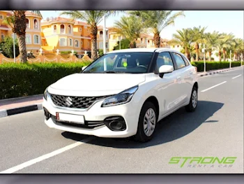 Suzuki  Baleno GL  4 Cylinder  Hatchback  White  2024