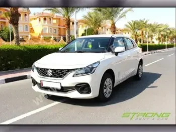 Suzuki  Baleno GL  4 Cylinder  Hatchback  White  2024