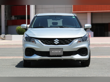 Suzuki  Baleno GL  4 Cylinder  Hatchback  White  2024