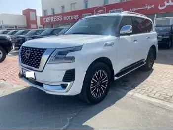 Nissan  Patrol  Platinum  2023  Automatic  35,000 Km  6 Cylinder  Four Wheel Drive (4WD)  SUV  White  With Warranty