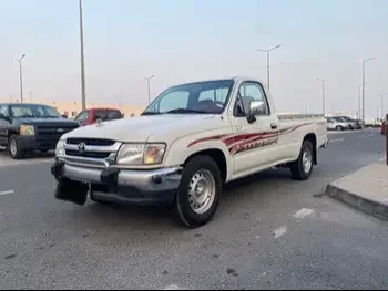 Toyota  Hilux  2004  Manual  69,000 Km  4 Cylinder  Four Wheel Drive (4WD)  Pick Up  White