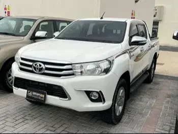 Toyota  Hilux  SR5  2016  Manual  93,000 Km  4 Cylinder  Four Wheel Drive (4WD)  Pick Up  White