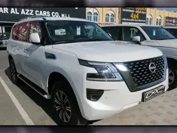 Nissan  Patrol  SE  2023  Automatic  0 Km  6 Cylinder  Four Wheel Drive (4WD)  SUV  White  With Warranty