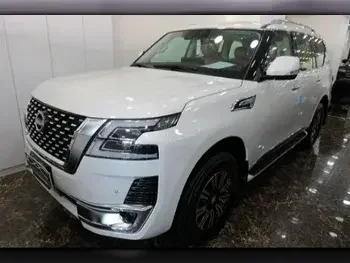 Nissan  Patrol  Titanium  2023  Automatic  0 Km  6 Cylinder  Four Wheel Drive (4WD)  SUV  White  With Warranty