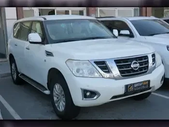 Nissan  Patrol  SE  2014  Automatic  200,000 Km  8 Cylinder  Four Wheel Drive (4WD)  SUV  White