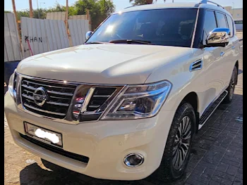 Nissan  Patrol  Platinum  2015  Automatic  186,000 Km  8 Cylinder  Four Wheel Drive (4WD)  SUV  White