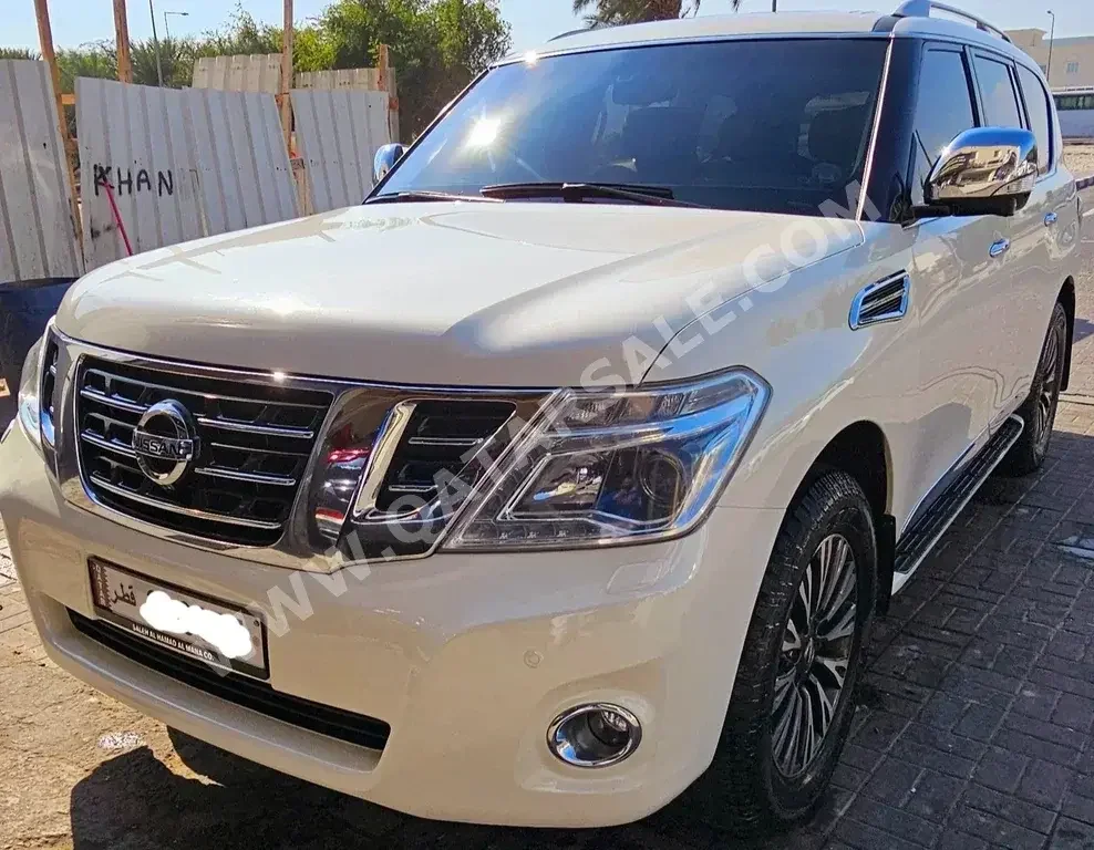 Nissan  Patrol  Platinum  2015  Automatic  186,000 Km  8 Cylinder  Four Wheel Drive (4WD)  SUV  White