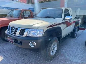 Nissan  Patrol  Pickup  2014  Manual  334,000 Km  6 Cylinder  Four Wheel Drive (4WD)  Pick Up  Beige