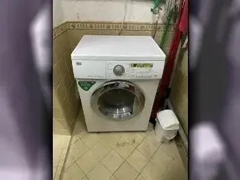 LG / Front Load Washer / 5 Kg White For Sale in Qatar
