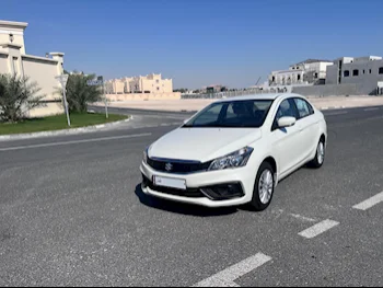 Suzuki  Ciaz  2024  Automatic  400 Km  4 Cylinder  Front Wheel Drive (FWD)  Sedan  White  With Warranty