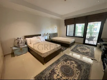 2 Bedrooms  Apartment  For Rent  in Doha -  The Pearl  Fully Furnished